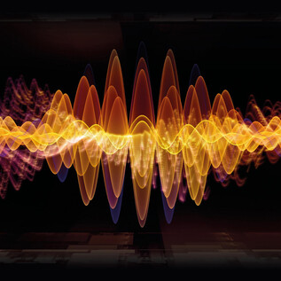 A group of musicians is playing together on a stage. The room has high windows and an acoustically pleasant atmosphere. | © ingimage