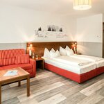 Bild von Juniorsuite mit 2 Einzelbetten und Schlafsofa | © Best Western Hotel am Walserberg